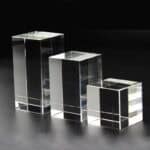 Acrylic display stands for retail, showcasing products with a sleek, modern look.
