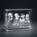 Custom glass photo block with kids in Christmas hats, perfect holiday keepsake.