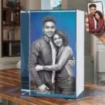 Custom 3D photo frame with personalized print of a smiling couple.