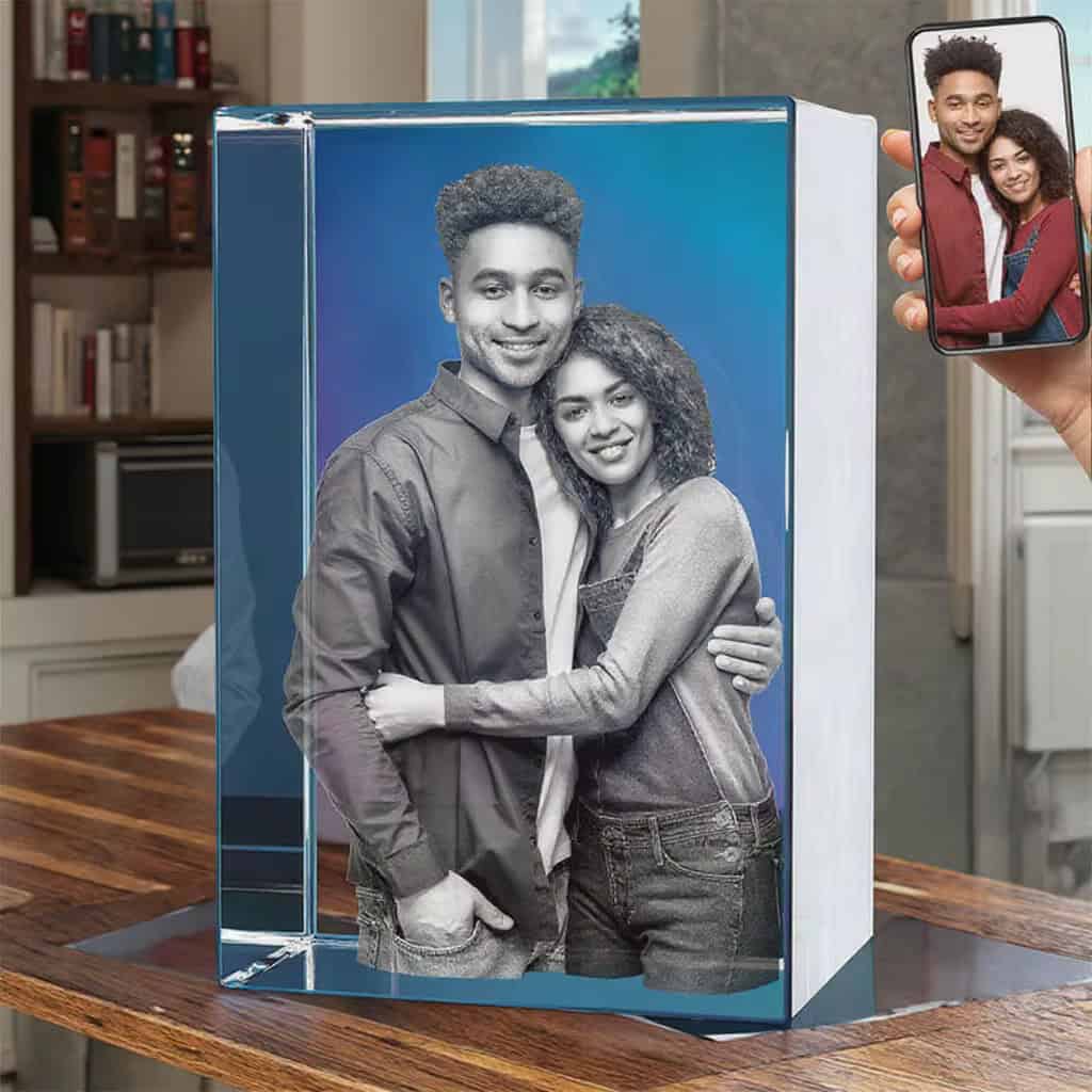Custom 3D photo frame with personalized print of a smiling couple.